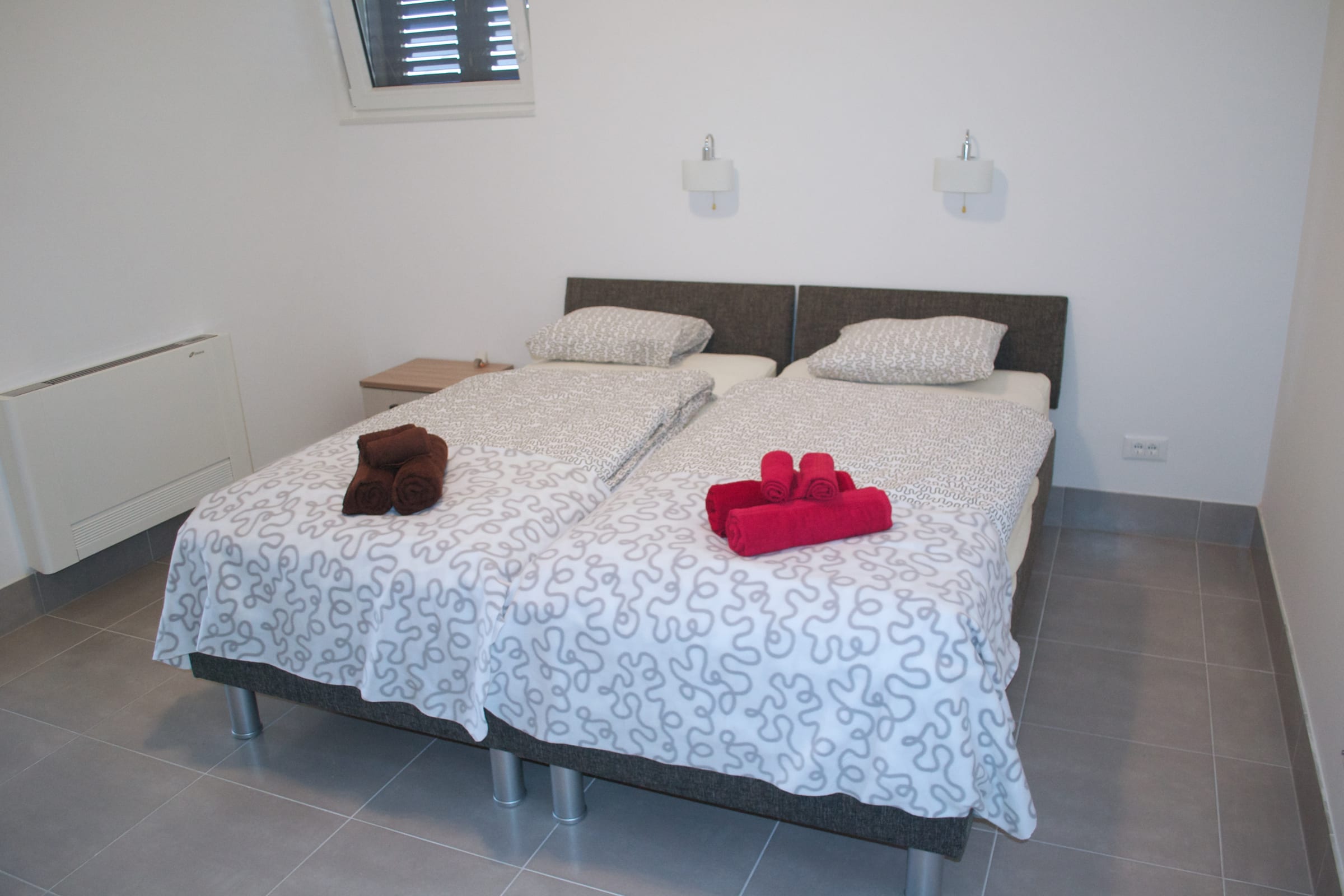Bedroom configuration (two single beds pulled together)